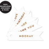 10 CELEBRATE COPPER FLAG TAGS ON WHITE