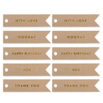 10 CELEBRATE GOLD FLAG TAGS ON KRAFT